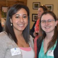 two women pose for picture
